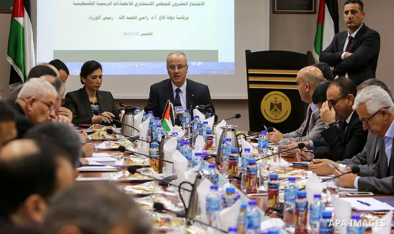 Palestinian Prime Minister Rami Hamdallah chairs the 20th Meeting of the Advisory Council for Official Statistics in the West Bank city of Ramallah, on February 22, 2018. Photo by Prime Minister Office