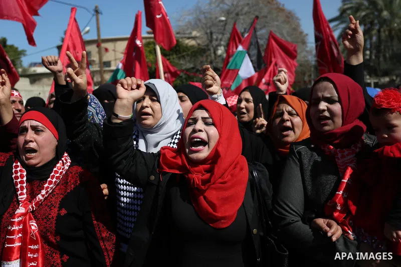 Palestinian supporters of the Democratic Front for the Liberation of Palestine (DFLP) take part in a rally marking the 49th anniversary of DFLP foundation in Gaza city on February 22, 2018. Photo by Ashraf Amra