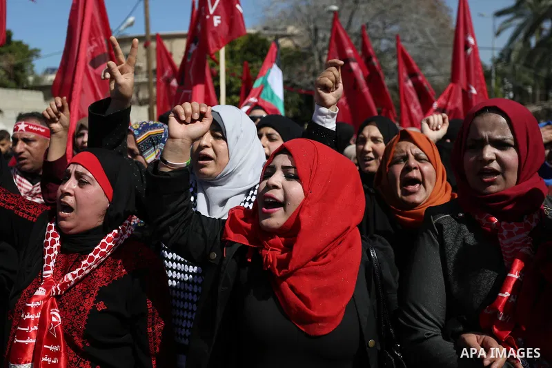 Palestinian supporters of the Democratic Front for the Liberation of Palestine (DFLP) take part in a rally marking the 49th anniversary of DFLP foundation in Gaza city on February 22, 2018. Photo by Ashraf Amra