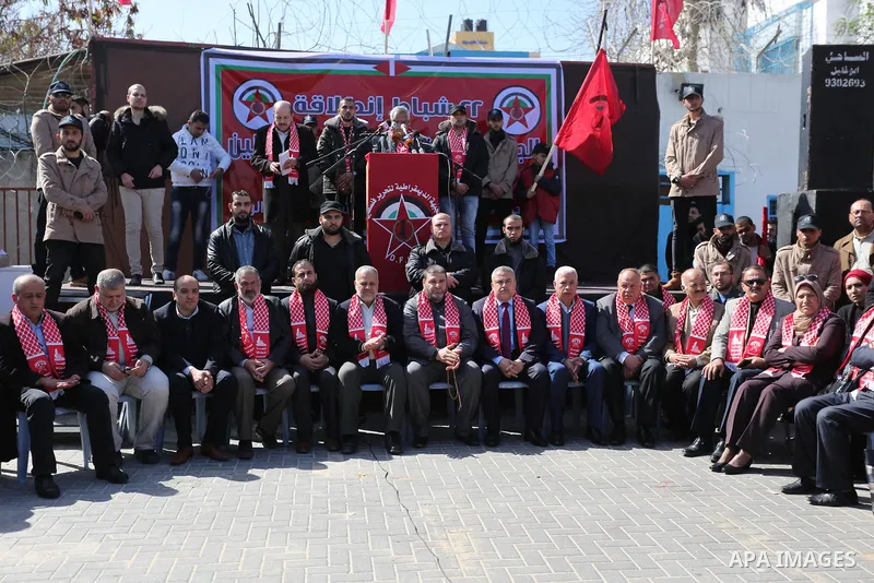 Palestinian supporters of the Democratic Front for the Liberation of Palestine (DFLP) take part in a rally marking the 49th anniversary of DFLP foundation in Gaza city on February 22, 2018. Photo by Ashraf Amra