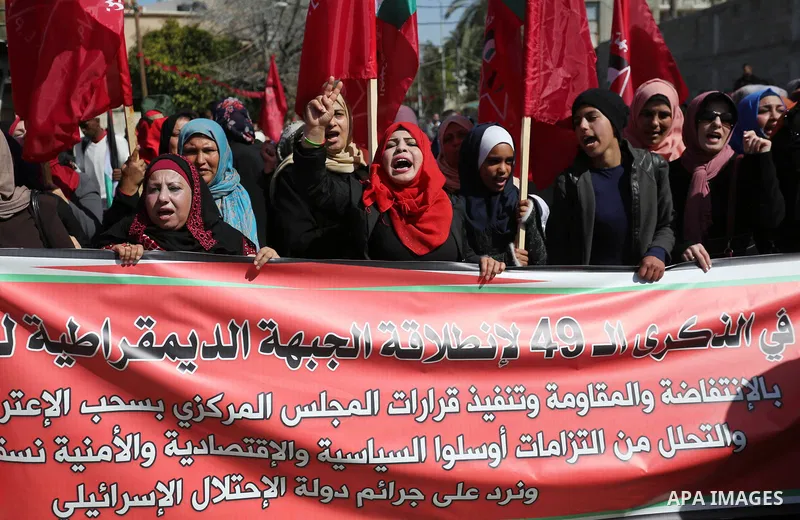 Palestinian supporters of the Democratic Front for the Liberation of Palestine (DFLP) take part in a rally marking the 49th anniversary of DFLP foundation in Gaza city on February 22, 2018. Photo by Ashraf Amra