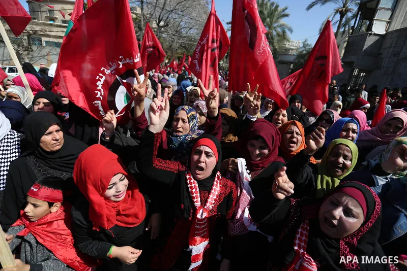 Palestinian supporters of the Democratic Front for the Liberation of Palestine (DFLP) take part in a rally marking the 49th anniversary of DFLP foundation in Gaza city on February 22, 2018. Photo by Ashraf Amra
