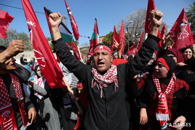 Palestinian supporters of the Democratic Front for the Liberation of Palestine (DFLP) take part in a rally marking the 49th anniversary of DFLP foundation in Gaza city on February 22, 2018. Photo by Ashraf Amra