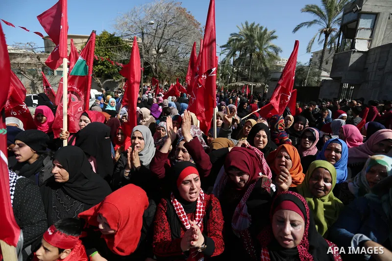 Palestinian supporters of the Democratic Front for the Liberation of Palestine (DFLP) take part in a rally marking the 49th anniversary of DFLP foundation in Gaza city on February 22, 2018. Photo by Ashraf Amra