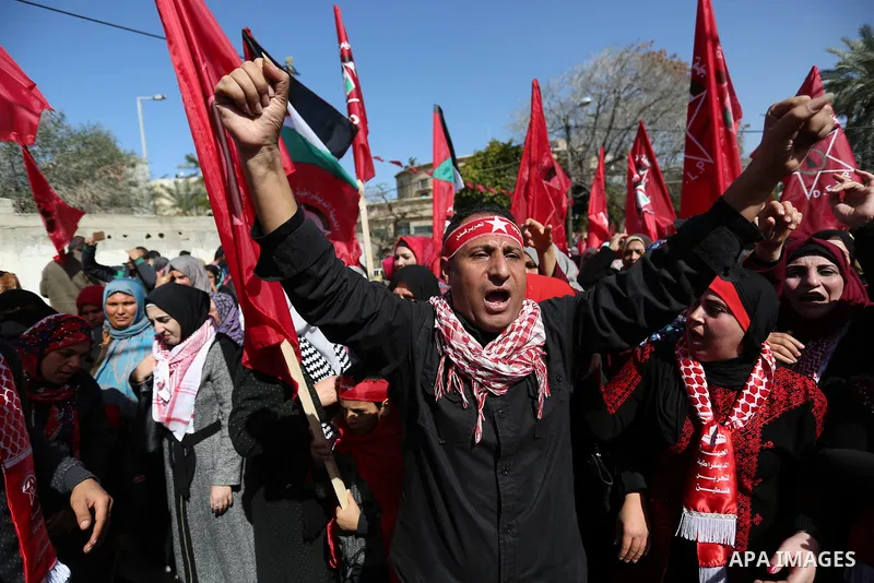 Palestinian supporters of the Democratic Front for the Liberation of Palestine (DFLP) take part in a rally marking the 49th anniversary of DFLP foundation in Gaza city on February 22, 2018. Photo by Ashraf Amra