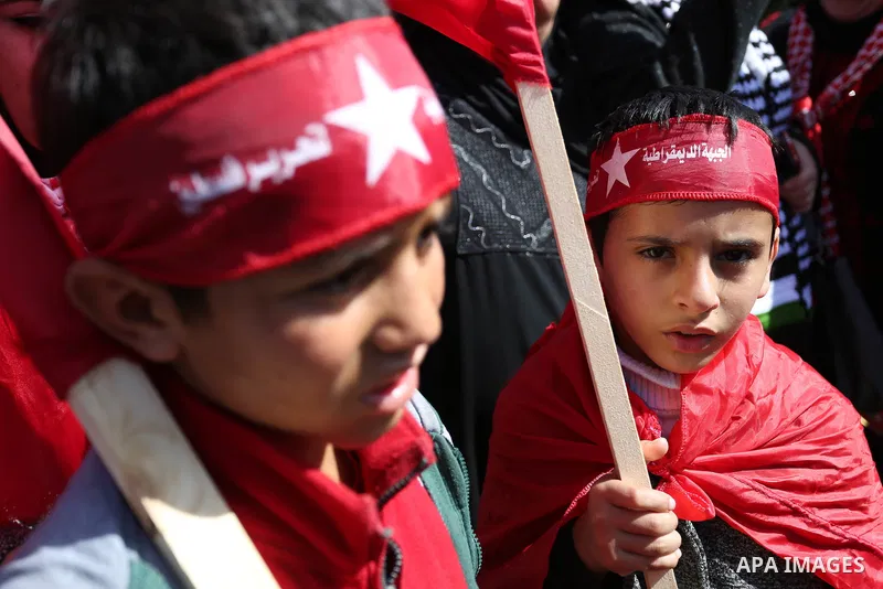 Palestinian supporters of the Democratic Front for the Liberation of Palestine (DFLP) take part in a rally marking the 49th anniversary of DFLP foundation in Gaza city on February 22, 2018. Photo by Ashraf Amra