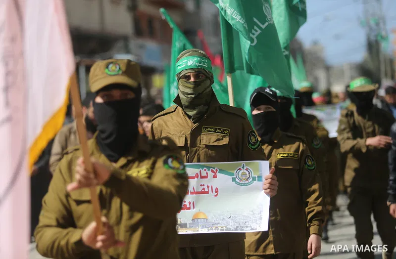 Palestinian supporters of Hamas movement take part in a protest against Trump's decision to recognize Jerusalem as the capital of Israel, at Nuseirat refugee camp, in the central of Gaza Strip on February 23, 2018. US Pr...