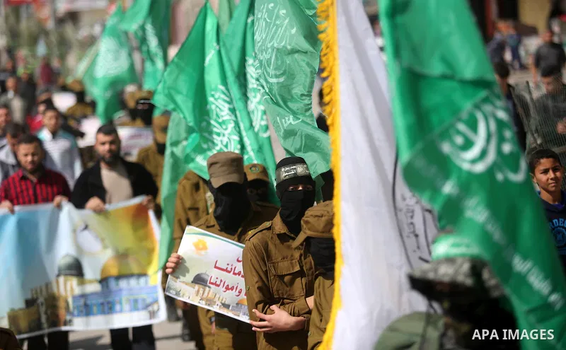 Palestinian supporters of Hamas movement take part in a protest against Trump's decision to recognize Jerusalem as the capital of Israel, at Nuseirat refugee camp, in the central of Gaza Strip on February 23, 2018. US Pr...