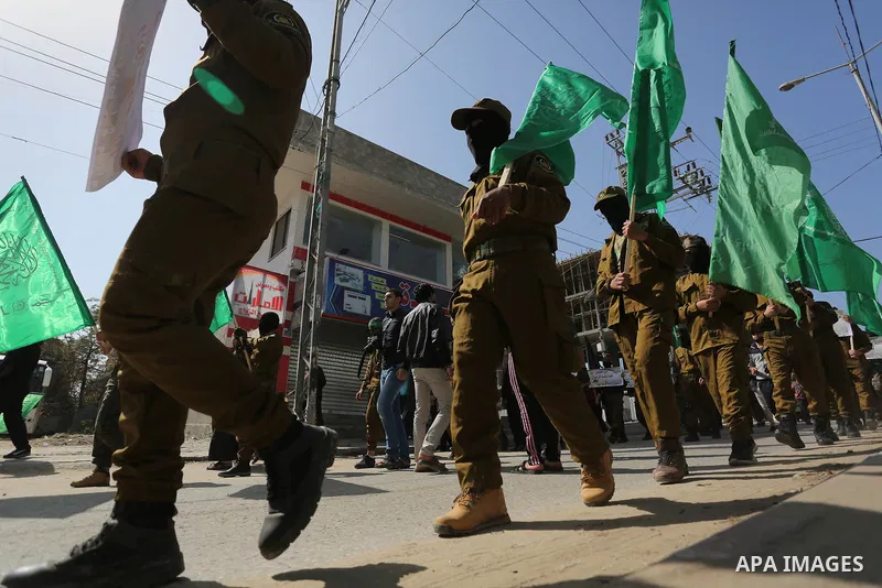 Palestinian supporters of Hamas movement take part in a protest against Trump's decision to recognize Jerusalem as the capital of Israel, at Nuseirat refugee camp, in the central of Gaza Strip on February 23, 2018. US Pr...
