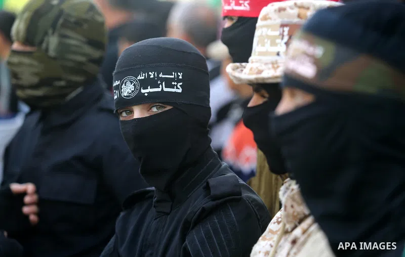 Palestinian supporters of Hamas movement take part in a protest against Trump's decision to recognize Jerusalem as the capital of Israel, at Nuseirat refugee camp, in the central of Gaza Strip on February 23, 2018. US Pr...