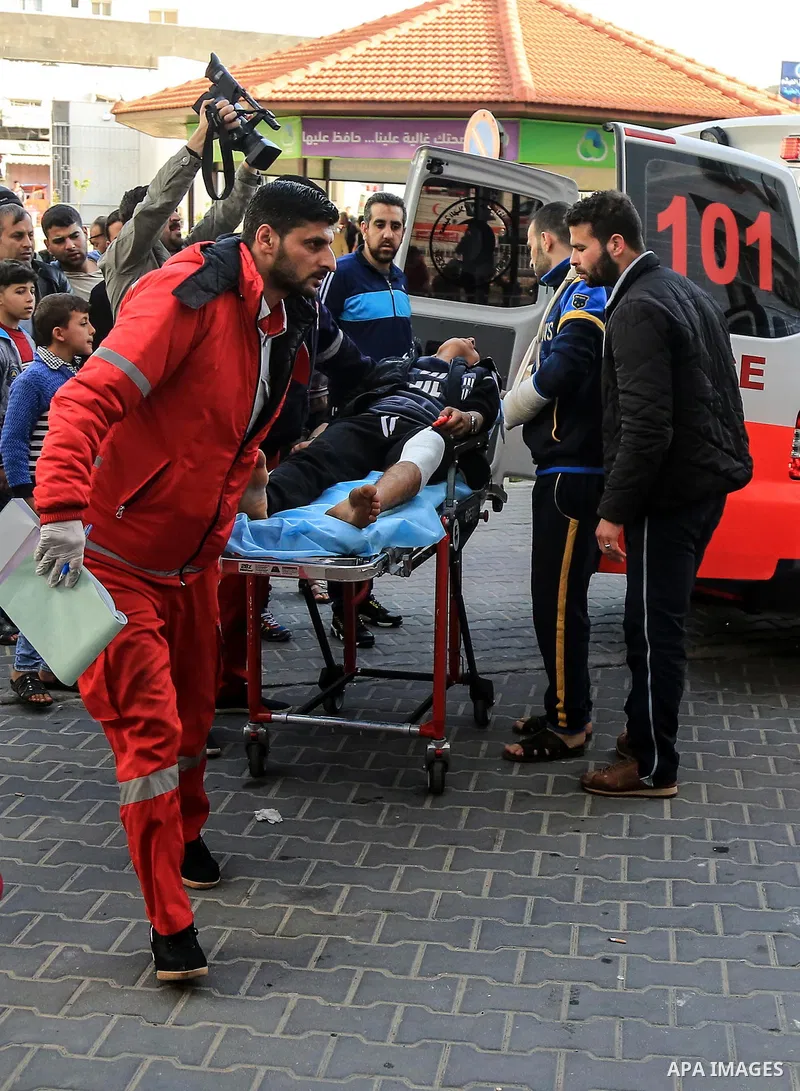 An injured Palestinian protester, who was wounded during clashes with the Israeli army along the Gaza border, recieves treatment at al-Shifa hospital in Gaza City on February 23, 2018. Photo by Dawoud Abo Alkas