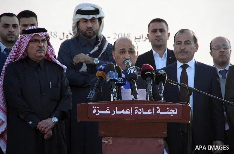 Palestinian housing minister Mufeed al-Hasayna speaks during the opening ceremony of rebuild Al-Rashid street project, funded by Qatar, in Gaza city, on February 24, 2018. Photo by Mahmoud Ajour
