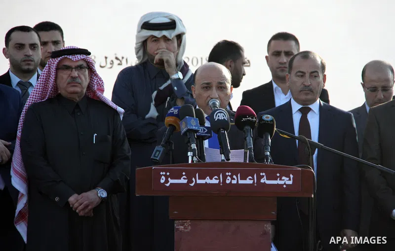 Palestinian housing minister Mufeed al-Hasayna speaks during the opening ceremony of rebuild Al-Rashid street project, funded by Qatar, in Gaza city, on February 24, 2018. Photo by Mahmoud Ajour