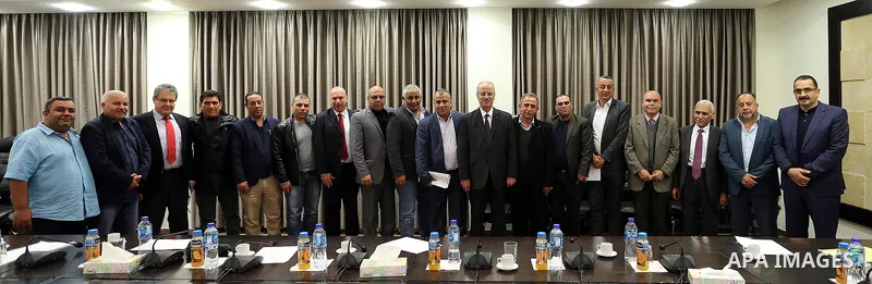 Palestinian Prime Minister Rami Hamdallah, chairs a meeting of the Executive Office of the West Bank camps in the West Bank city of Ramallah, on February 25, 2018. Photo by Prime Minister Office