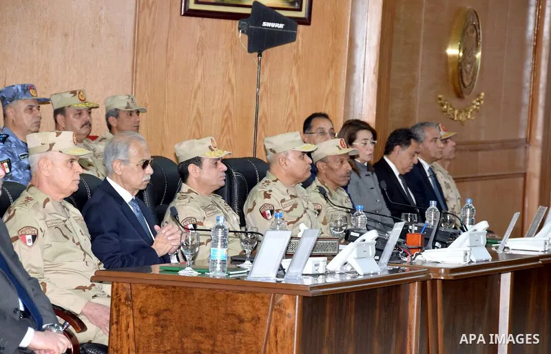 Egyptian President Abdel Fattah al-Sisi dressed in military uniform during his visit to the headquarters of the eastern forces of the Suez Canal at an unknown location in the Sinai on February 25, 2018. Photo by Egyptian...