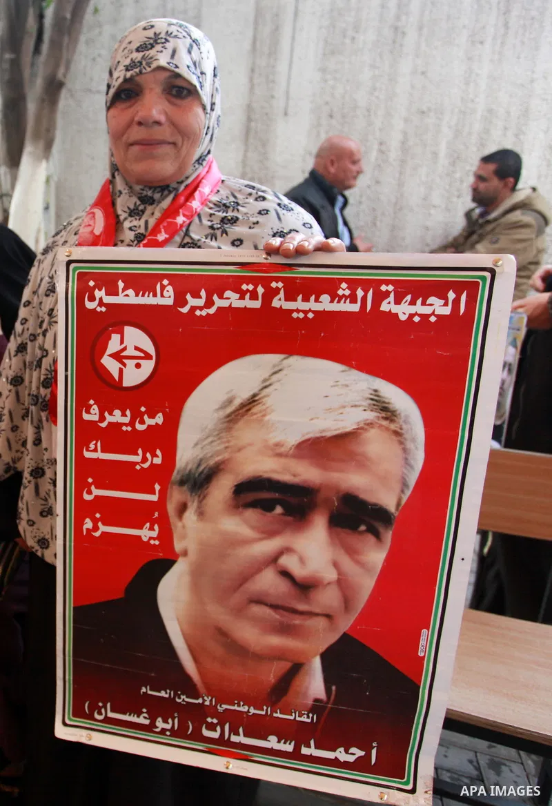 Palestinians take part in a protest to show solidarity with Palestinian prisoners held in Israeli jails, in front of Red cross office in Gaza city on February 26, 2018. Photo by Mahmoud Ajour