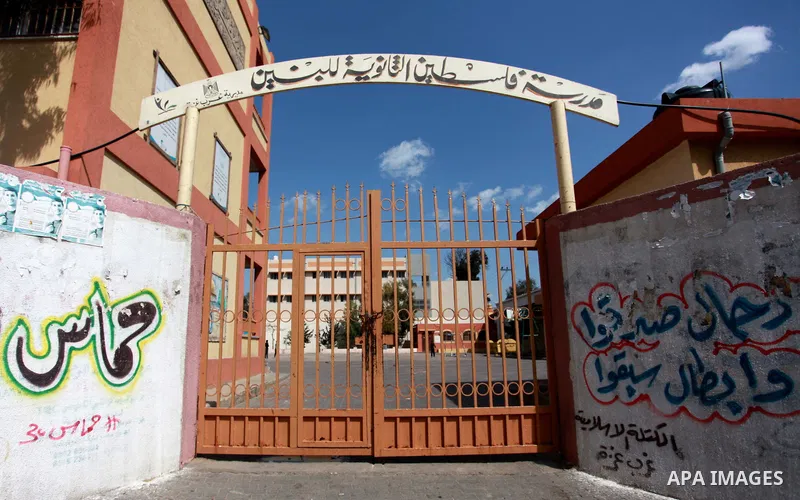 A general views shows the closed gates of school during a general strike for government ministries in Gaza City on February 26, 2018. Photo by Mahmoud Ajour