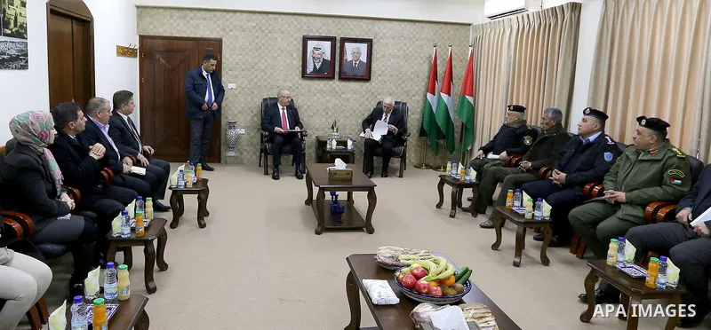 Palestinian Prime Minister Rami Hamdallah meets with Governor of Hebron Kamel Hamid during his visiting on February 26, 2018 in the West Bank city of Hebron. Photo by Prime Minister Office