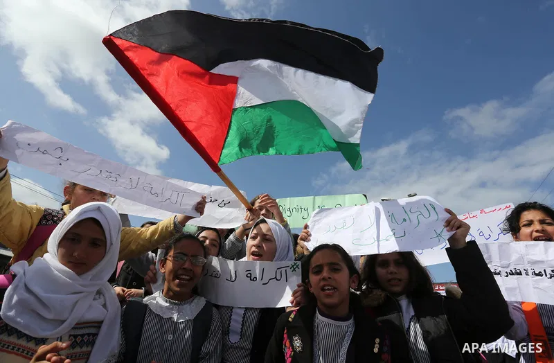 Palestinian students of United Nations-run schools take part in a protest against a U.S. decision to cut aid, in Khan Younis in the southern Gaza Strip February 27, 2018. Photo by Ashraf Amra