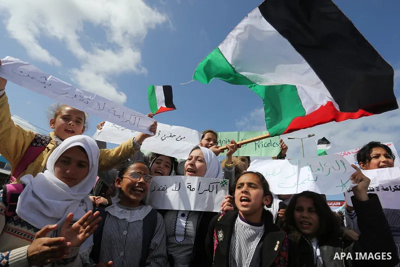 Palestinian students of United Nations-run schools take part in a protest against a U.S. decision to cut aid, in Khan Younis in the southern Gaza Strip February 27, 2018. Photo by Ashraf Amra