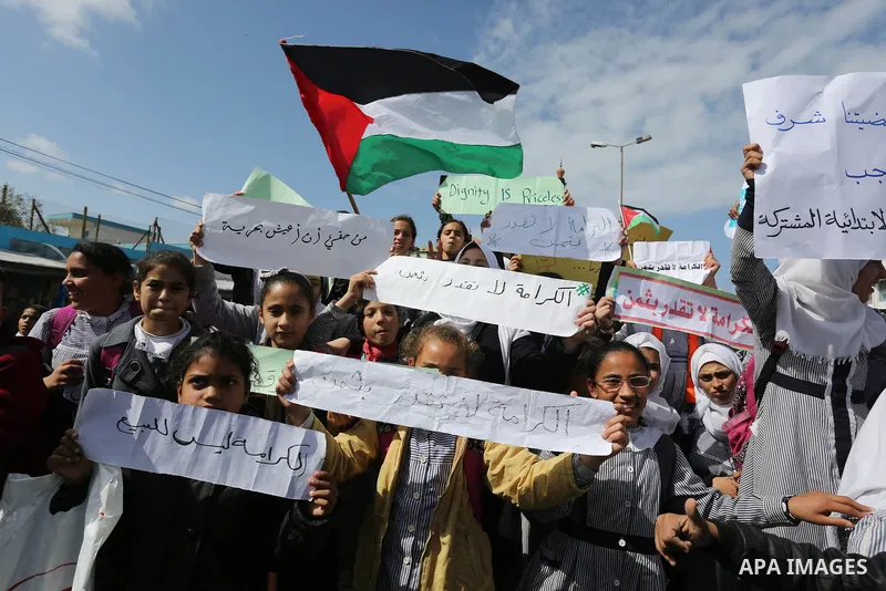 Palestinian students of United Nations-run schools take part in a protest against a U.S. decision to cut aid, in Khan Younis in the southern Gaza Strip February 27, 2018. Photo by Ashraf Amra