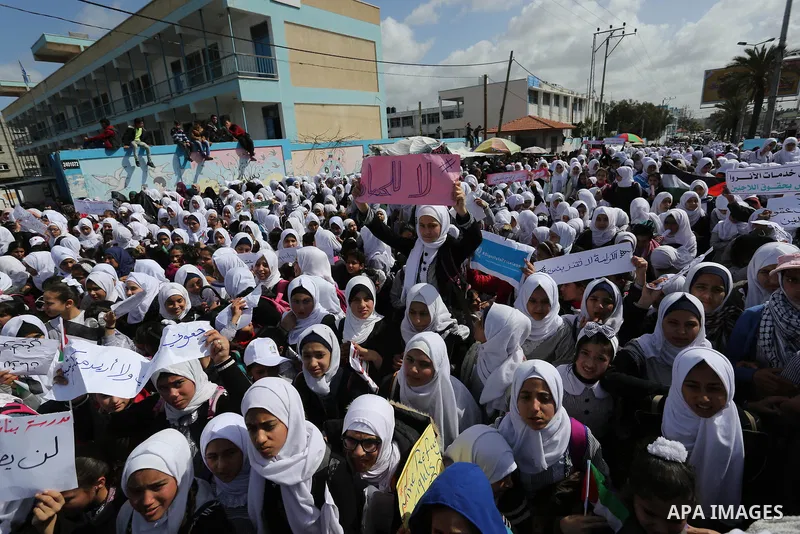 Palestinian students of United Nations-run schools take part in a protest against a U.S. decision to cut aid, in Khan Younis in the southern Gaza Strip February 27, 2018. Photo by Ashraf Amra