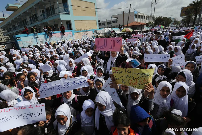 Palestinian students of United Nations-run schools take part in a protest against a U.S. decision to cut aid, in Khan Younis in the southern Gaza Strip February 27, 2018. Photo by Ashraf Amra