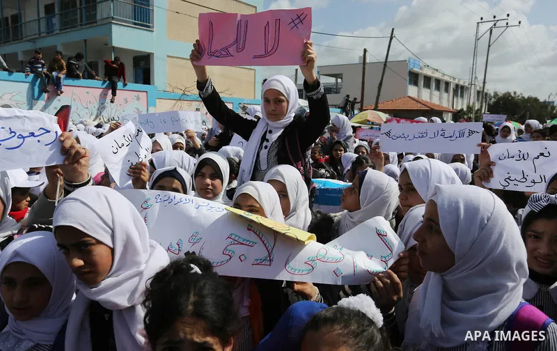 Palestinian students of United Nations-run schools take part in a protest against a U.S. decision to cut aid, in Khan Younis in the southern Gaza Strip February 27, 2018. Photo by Ashraf Amra