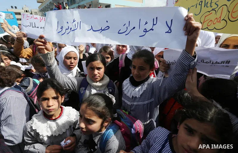 Palestinian students of United Nations-run schools take part in a protest against a U.S. decision to cut aid, in Khan Younis in the southern Gaza Strip February 27, 2018. Photo by Ashraf Amra