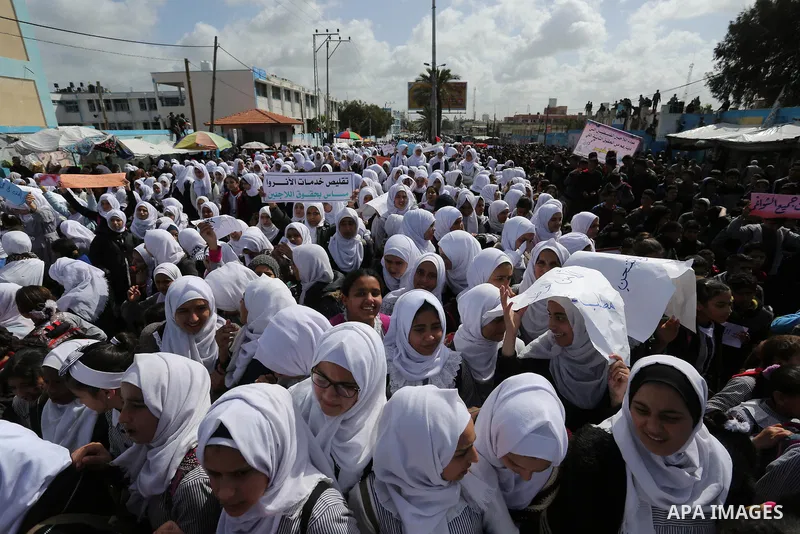 Palestinian students of United Nations-run schools take part in a protest against a U.S. decision to cut aid, in Khan Younis in the southern Gaza Strip February 27, 2018. Photo by Ashraf Amra