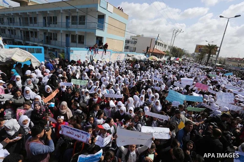 Palestinian students of United Nations-run schools take part in a protest against a U.S. decision to cut aid, in Khan Younis in the southern Gaza Strip February 27, 2018. Photo by Ashraf Amra