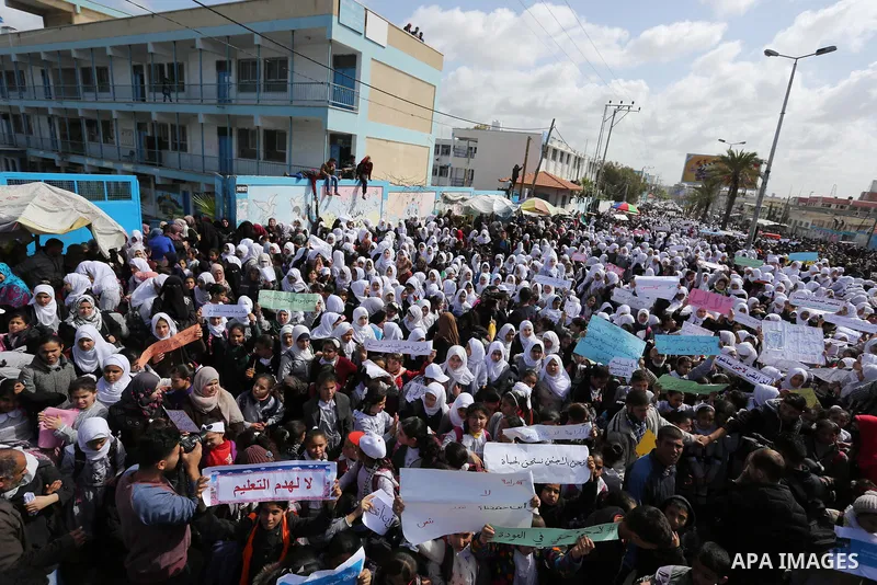Palestinian students of United Nations-run schools take part in a protest against a U.S. decision to cut aid, in Khan Younis in the southern Gaza Strip February 27, 2018. Photo by Ashraf Amra