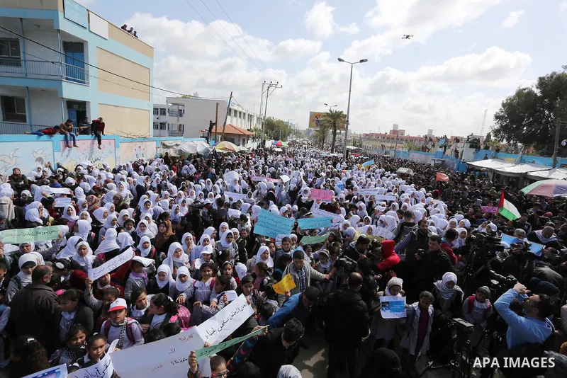 Palestinian students of United Nations-run schools take part in a protest against a U.S. decision to cut aid, in Khan Younis in the southern Gaza Strip February 27, 2018. Photo by Ashraf Amra