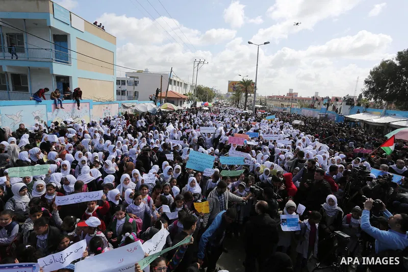 Palestinian students of United Nations-run schools take part in a protest against a U.S. decision to cut aid, in Khan Younis in the southern Gaza Strip February 27, 2018. Photo by Ashraf Amra