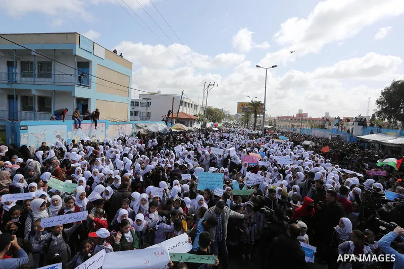 Palestinian students of United Nations-run schools take part in a protest against a U.S. decision to cut aid, in Khan Younis in the southern Gaza Strip February 27, 2018. Photo by Ashraf Amra