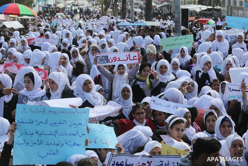 Palestinian students of United Nations-run schools take part in a protest against a U.S. decision to cut aid, in Khan Younis in the southern Gaza Strip February 27, 2018. Photo by Ashraf Amra