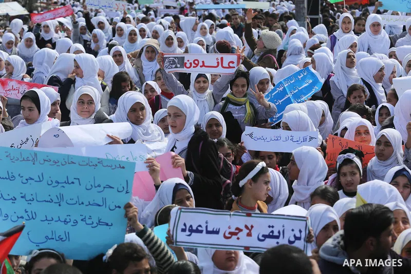 Palestinian students of United Nations-run schools take part in a protest against a U.S. decision to cut aid, in Khan Younis in the southern Gaza Strip February 27, 2018. Photo by Ashraf Amra