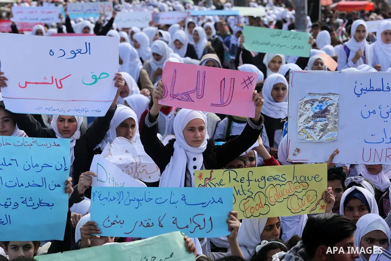 Palestinian students of United Nations-run schools take part in a protest against a U.S. decision to cut aid, in Khan Younis in the southern Gaza Strip February 27, 2018. Photo by Ashraf Amra