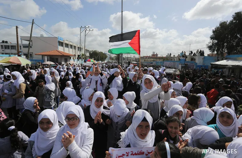 Palestinian students of United Nations-run schools take part in a protest against a U.S. decision to cut aid, in Khan Younis in the southern Gaza Strip February 27, 2018. Photo by Ashraf Amra