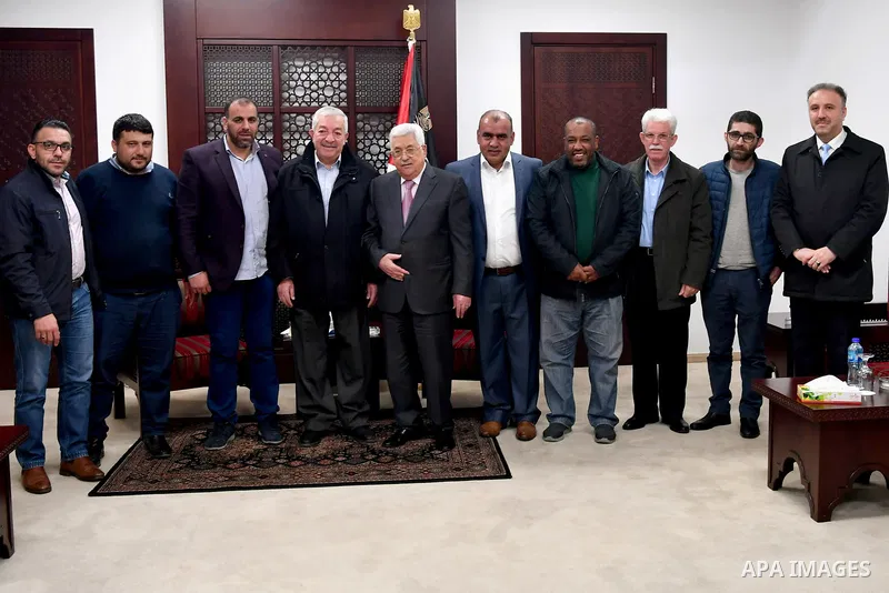 Palestinian President Mahmoud Abbas meets with members of Jerusalem region at his headquarters in the West Bank city of Ramallah on February 27, 2018. Photo by Osama Falah