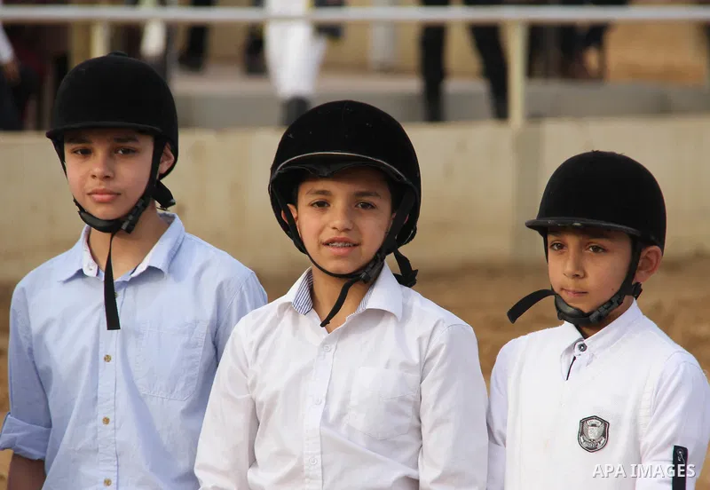 Palestinian competitors take part during a local jumping competition "friends challenge" in Gaza city on March 2, 2018. Photo by Mahmoud Ajour
