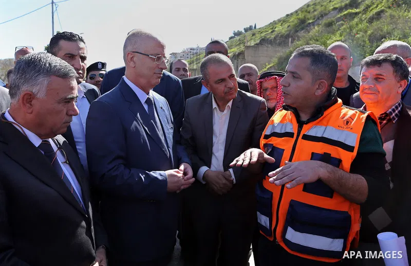 Palestinian Prime Minister Rami Hamdallah inspects the progress of the rehabilitation project of the main street west of Anabta, near the West Bank city of Tulkarm on March 3, 2018. Photo by Prime Minister Office