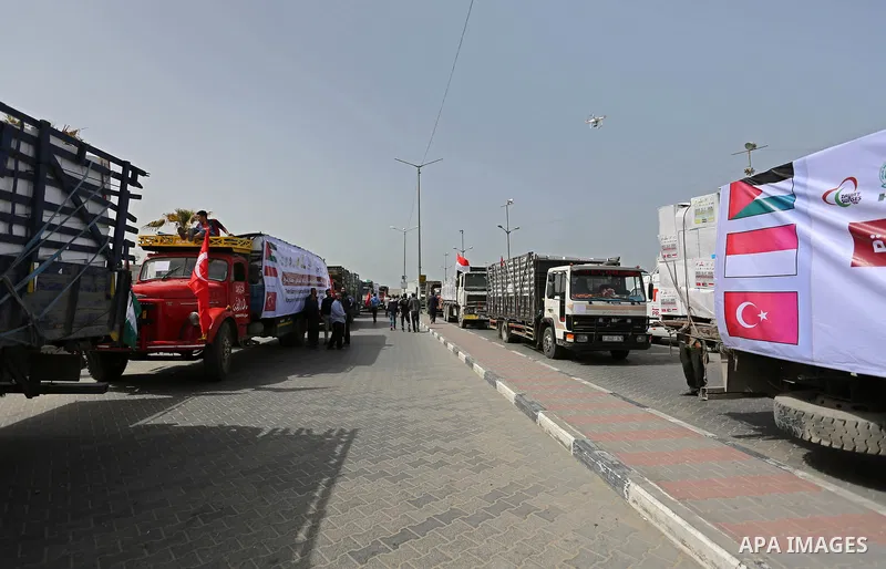 trucks loded with Food aid, are seen in Gaza sea port, on March 6, 2018. The Food aid donated by Indonesian institutions under the auspices of SPM for Poor families. Photo by Ashraf Amra