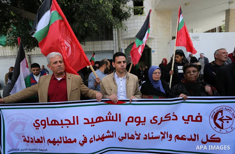 Palestinian supporters of Popular Front for the Liberation of Palestine (PFLP) take part during a rally to mark martyr's day of Mohammed al-Aswad "Guevara Gaza" a member of the Political Bureau of (PFLP), in Gaza city on...