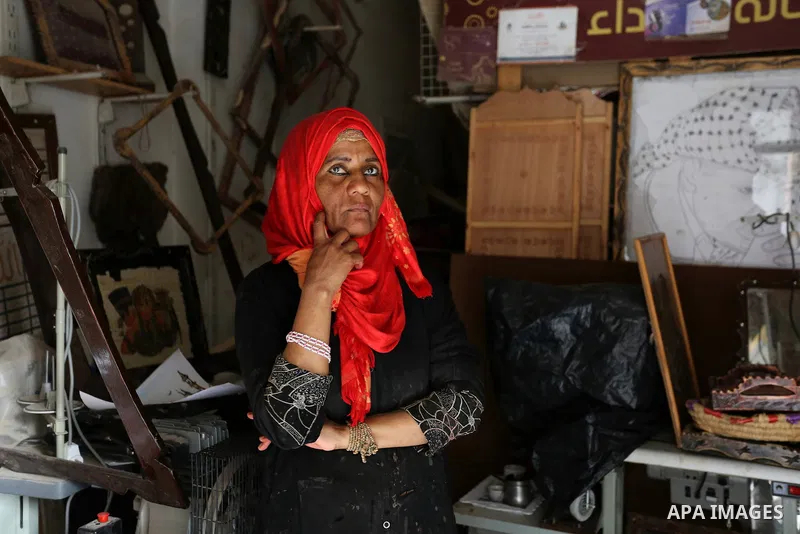 Amel Abu Rgayeg, a 40 years old Palestinian refugee carpenter, works in her small carpentry workshop, at al-Nusairat refugee camp in the central Gaza Strip, 08 March 2018. Amel was married to a man from the Arab citizens...