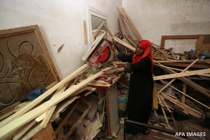 Amel Abu Rgayeg, a 40 years old Palestinian refugee carpenter, works in her small carpentry workshop, at al-Nusairat refugee camp in the central Gaza Strip, 08 March 2018. Amel was married to a man from the Arab citizens...