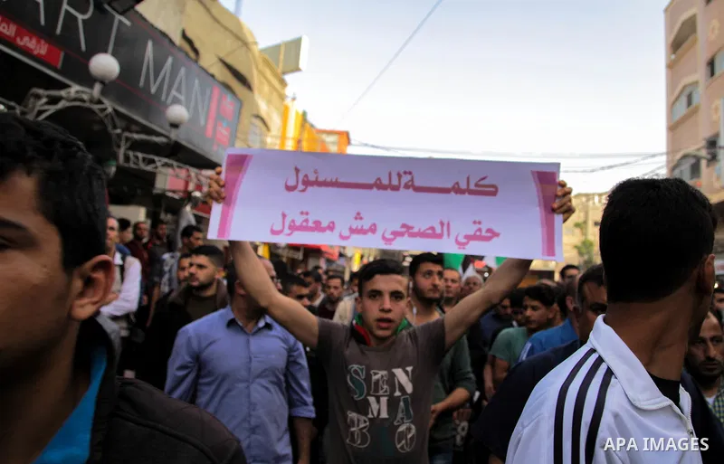Palestinians participate in a demonstration to support the palestinian reconciliation efforts between Fatah and Hamas, and demand better living conditions, in Jabalia in the northern Gaza Strip on February 01, 2018. Phot...