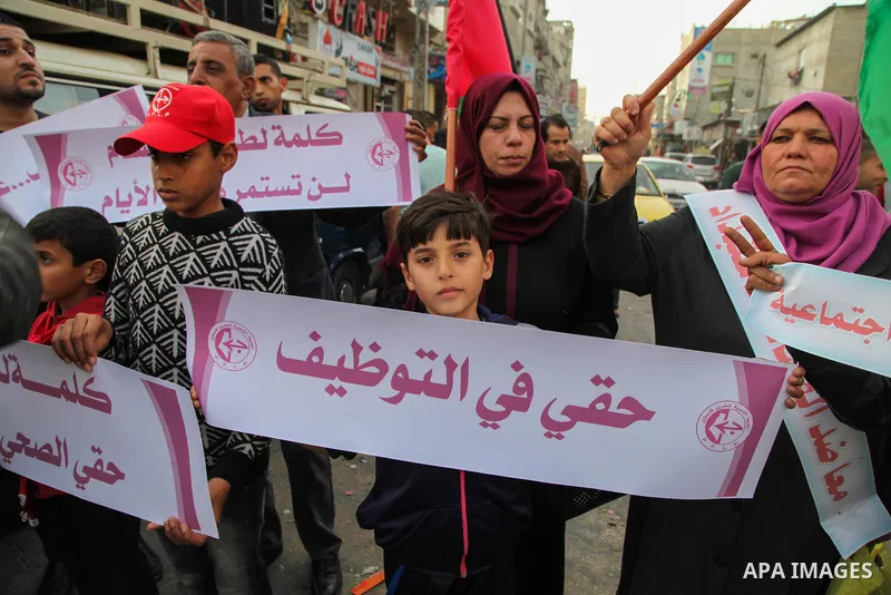 Palestinians participate in a demonstration to support the palestinian reconciliation efforts between Fatah and Hamas, and demand better living conditions, in Jabalia in the northern Gaza Strip on February 01, 2018. Phot...