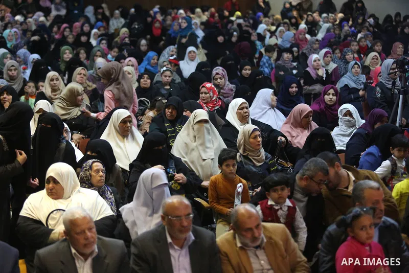 Palestinian supporters of Islamic Jihad hold take part during a Stage show in a celebrate on the occasion of International Women's Day in Gaza city, March 10, 2018. Photo by Ashraf Amra