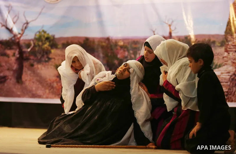 Palestinian supporters of Islamic Jihad hold take part during a Stage show in a celebrate on the occasion of International Women's Day in Gaza city, March 10, 2018. Photo by Ashraf Amra